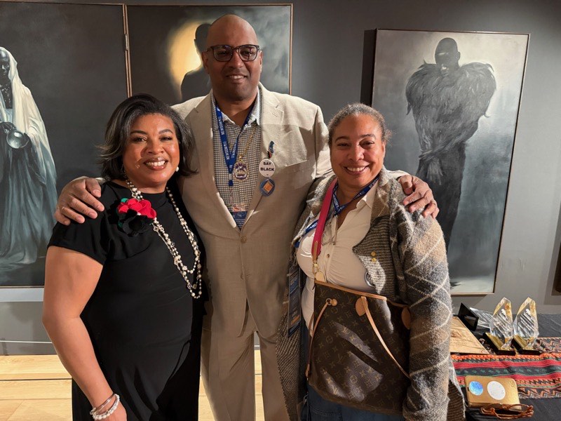 Cedric at art gallery with community leaders