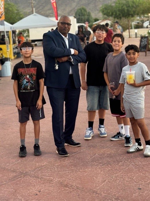 Cedric engaging with local youth